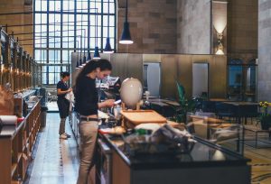 two women working at hotel desk