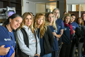 volunteers painting refugee center